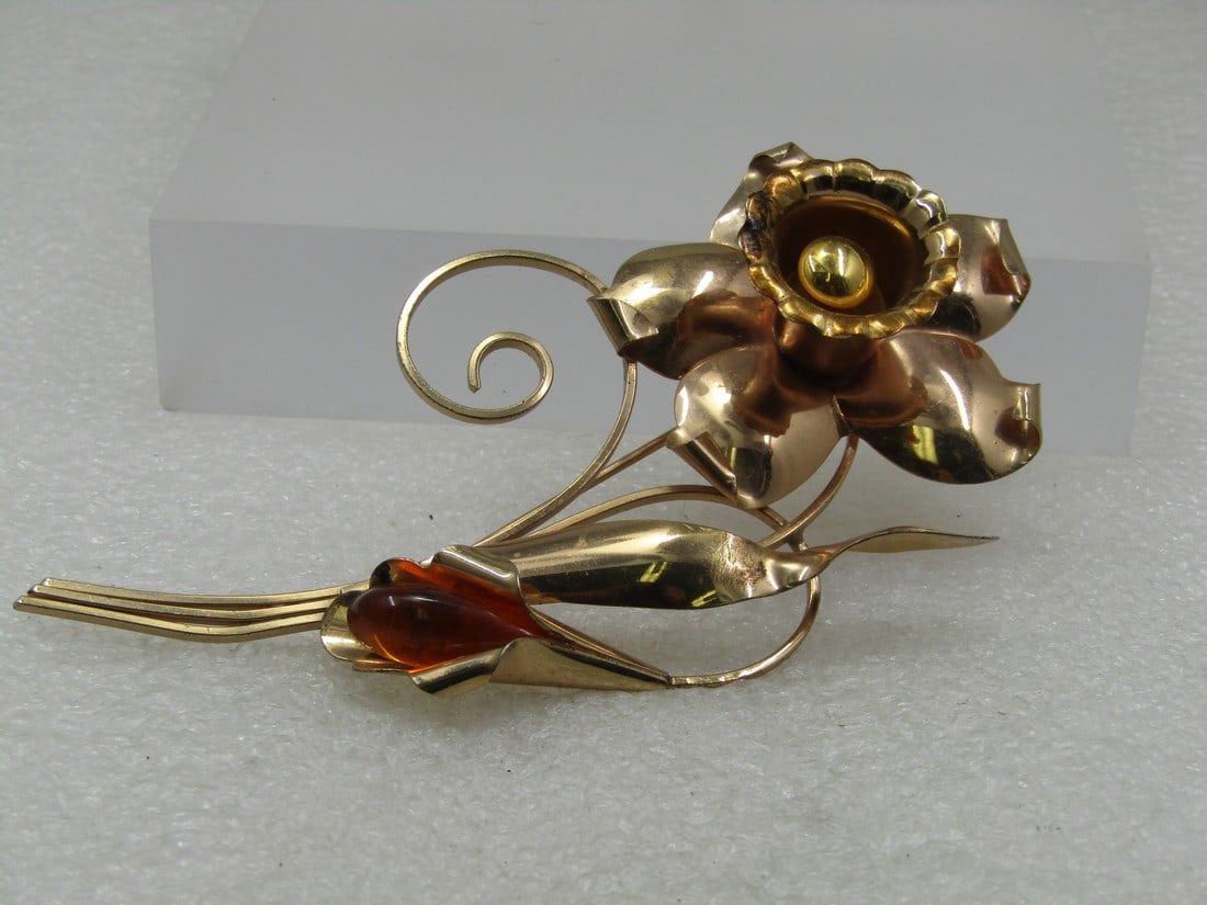 Vintage Coro Sterling Gold Over Floral Brooch, Faux Amber, Mid-Century: Vintage Coro Sterling Gold Over Floral Brooch, Faux Amber, Mid-Century. 4.25" tall and 2" wide. This has a mid-century mod design with coiled accents. It is a daffodil and calla lily. The daffodil is
