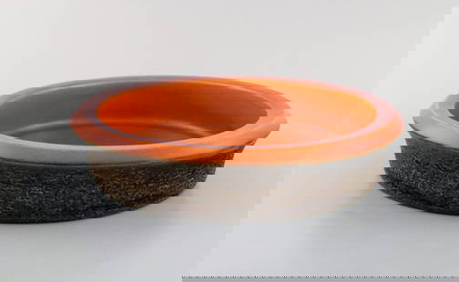 Mari Simmulson for Upsala-Ekeby. Dish in glazed stoneware. Glaze in brown and orange shades. 1960's.: Mari Simmulson for Upsala-Ekeby. Dish in glazed stoneware. Glaze in brown and orange shades. 1960's. In very good condition. Two minor glaze defects on the rim. Measures: 23 x 5 cm Stamped. Reserve: $