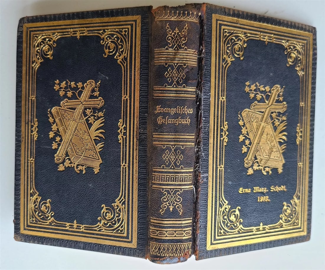 1900 EVANGELISCHES GESANGBUCH antique GERMAN HYMNAL Americana nice binding: EVANGELISCHES GESANGBUCH St.Louis, MO; 1900 Size: 4 by 6" 98 pp Original leather binding , decorated in gilt. Original slip case. Front cover is rudely repaired Very good interior, gilt edge text in E