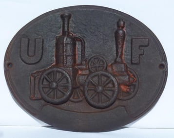 A vintage cast iron reproduction firemark