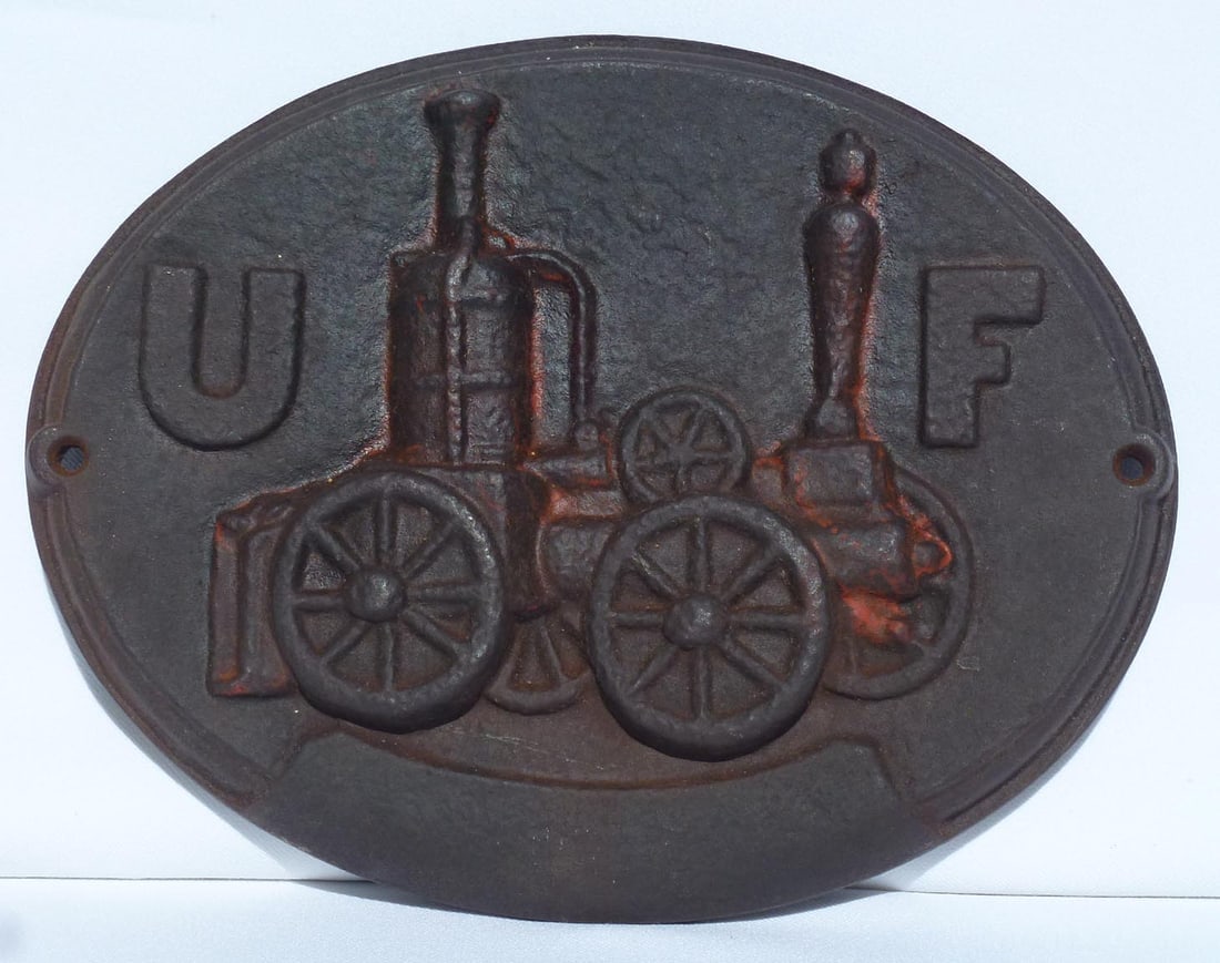 A vintage cast iron reproduction firemark (1 of 5)