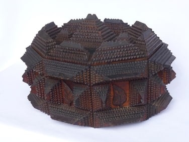 An unusual, detailed octagonal tramp art box