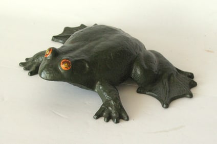 Antique cast iron frog doorstop.