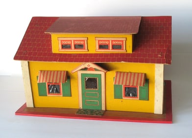 Vintage cardboard doll house made in Maine.