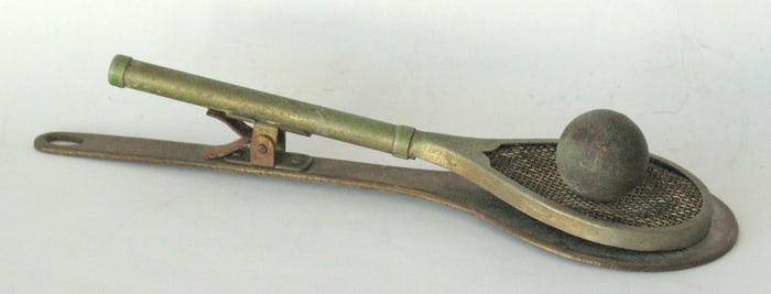 Antique cast metal tennis racket paper clip.