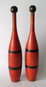 Antique painted wood Indian clubs or juggling pins.