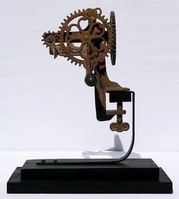 A wonderful looking, old metal apple peeler