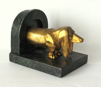 Vintage cast metal Dachshund bookend.