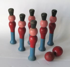 Antique toy skittle soldiers.