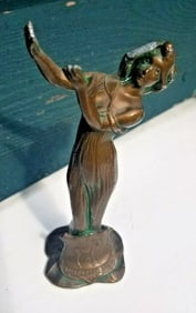 Ornate art nouveau deco woman flowing hair badge with deer statue souvenir