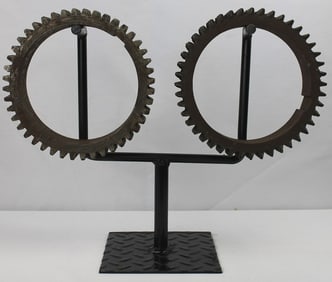 2 old large, decorative industrial iron gears