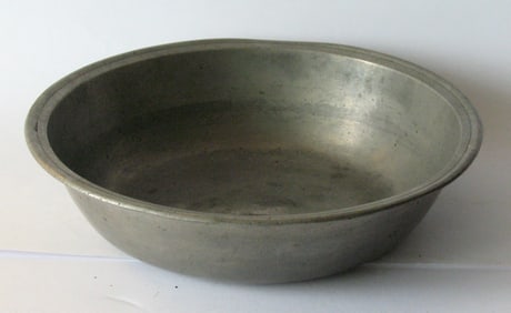 Antique pewter basin.