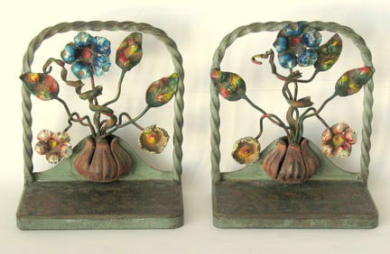 Antique cast iron stylized flowers bookends.
