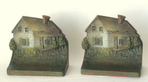 Antique cast iron Edgar Allen Poe house bookends.