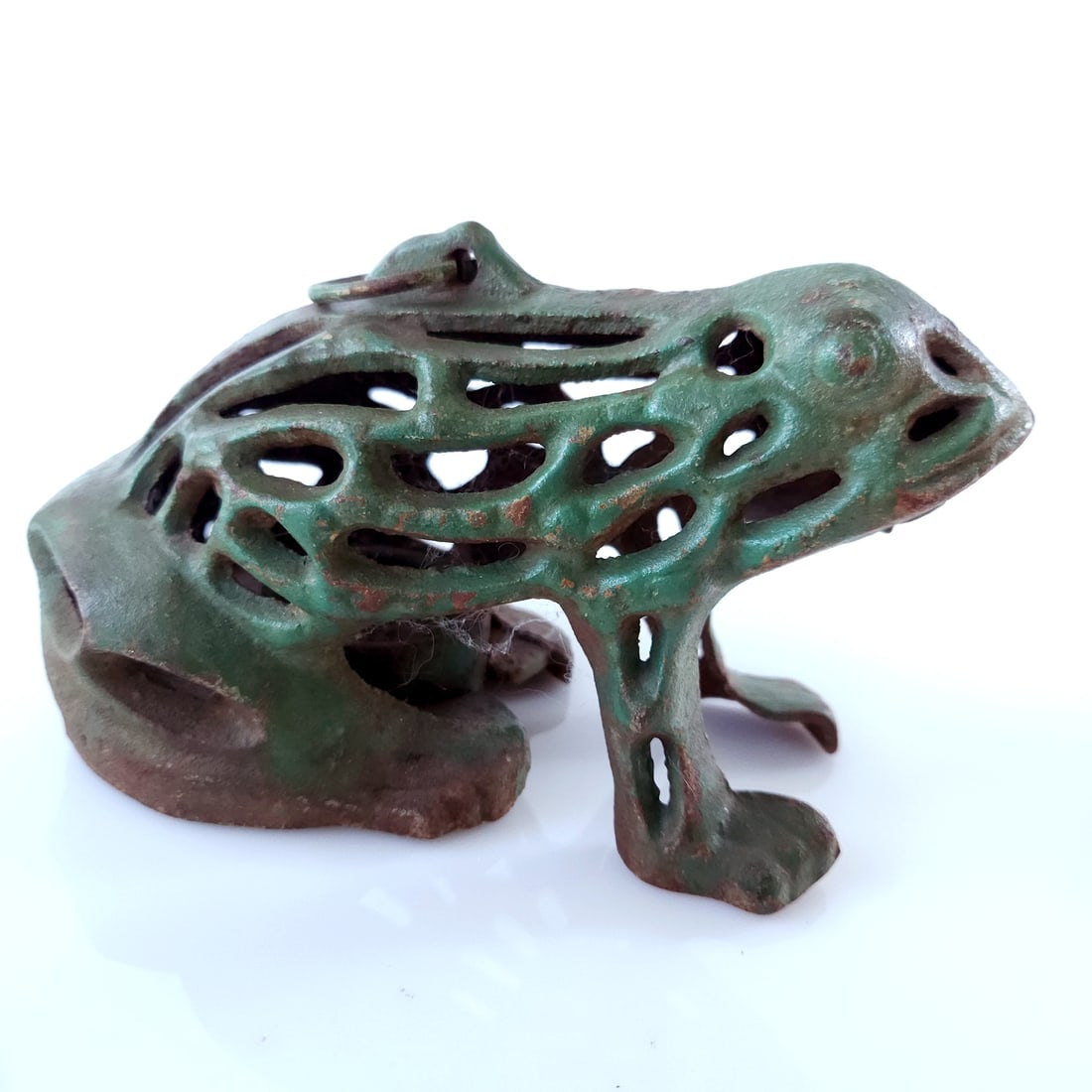 Green Cast Iron Frog Lantern Tea Light Candle Holder Japan: Title: Green Cast Iron Frog Lantern Tea Light Candle Holder Japan Description: Japanese Garden Frog Cast Iron Lanterns Tea Light Candle Holders 7" long x 4" tall excellent condition with original gree