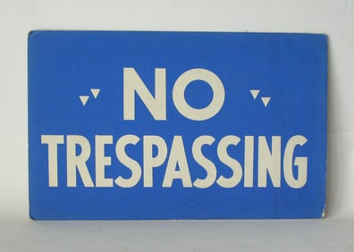 Vintage cardboard “NO TRESPASSING” sign
