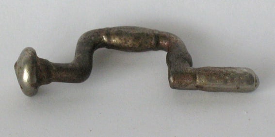 Antique cast iron carpenter's brace paper weight.