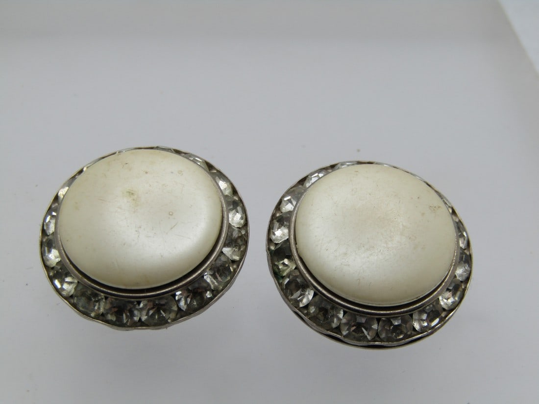 Vintage Coro Faux Pearl Rhinestone Clip Earrings, 1940's-1950's: Vintage Coro Faux Pearl Rhinestone Clip Earrings, 1940's-1950's. They are appx. 1" round with a faux pearl top and a tapered channel-set rhinestone frame. Clear rhinestones. The one does have a few sp
