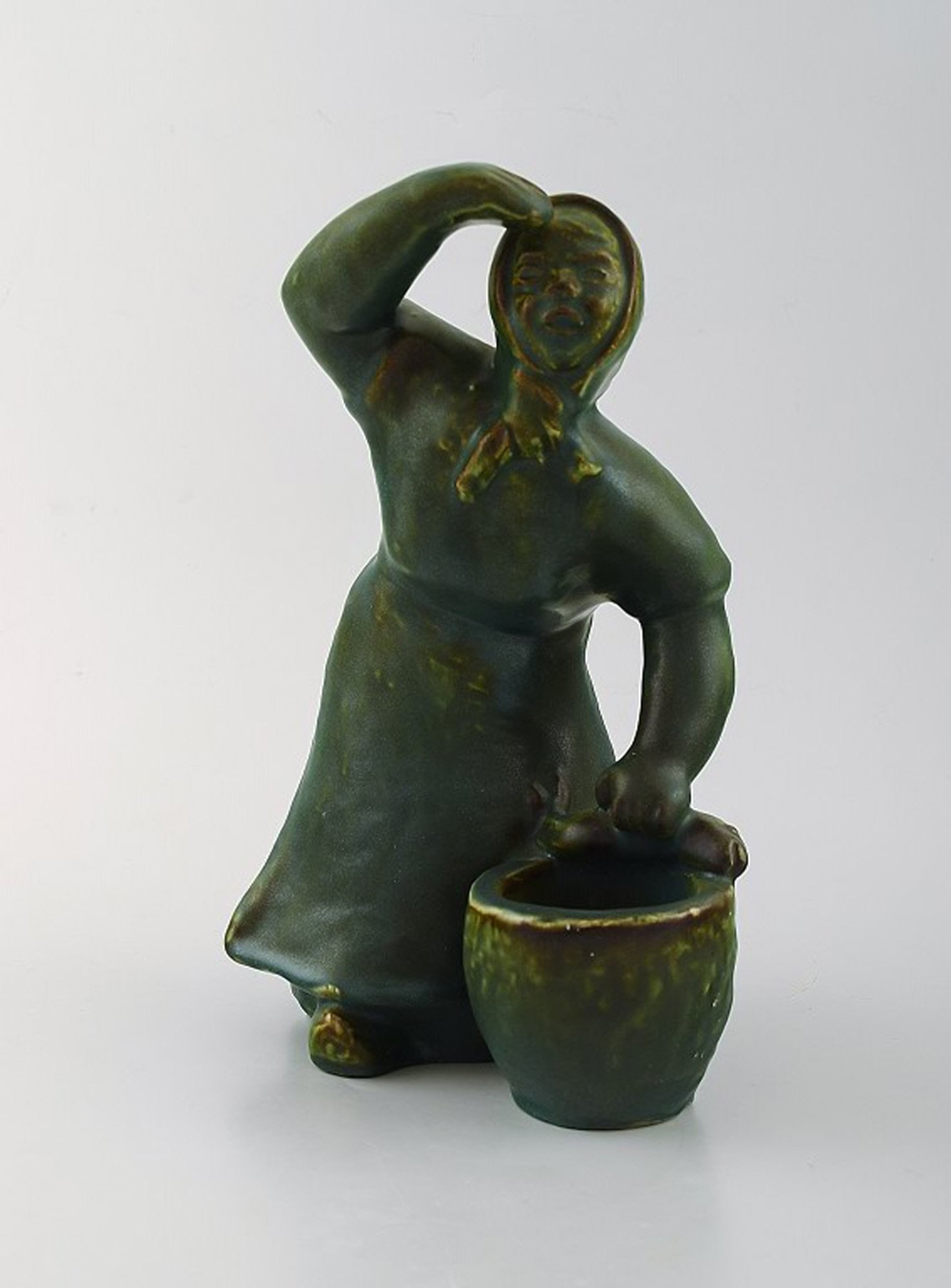 Michael Andersen pottery from Bornholm. Large figure of fisherman's wife.: Michael Andersen pottery from Bornholm. Large figure of fisherman's wife. Measures: 23.5 x 16 cm. Perfect condition. Reserve: $165.00 Shipping: Domestic: Shipping rates are determined by destination I