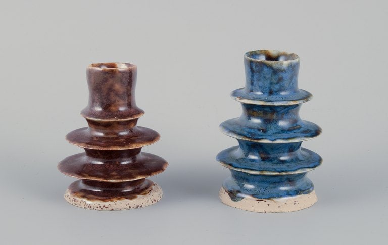 European studio ceramicist. Two unique ceramic candleholders. Glaze in blue and brown shades.: European studio ceramicist. Two unique ceramic candleholders. Glaze in blue and brown shades. Ca. 1980s. Signed MR. Perfect condition. Blue: H 9.8 cm x D 6.8 cm. Reserve: $140.00 Shipping: Domestic: S