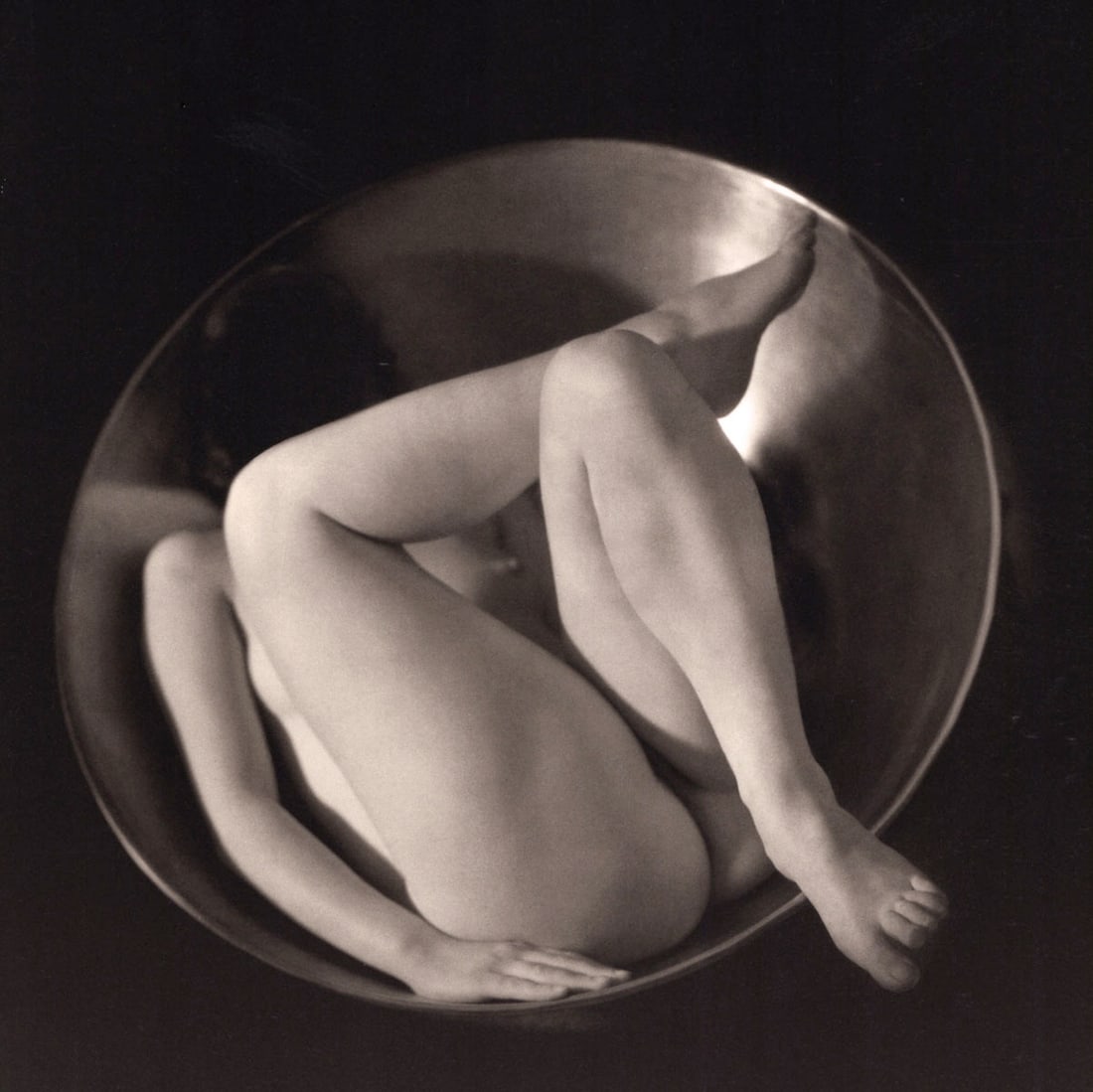 RUTH BERNHARD - In the Circle, 1934: Artist: RUTH BERNHARD Print Title: n the Circle, 1934 Medium: Duotone Photoengraving Printed in USA in 1980’s Image Size approx: 8 x 8” Ruth Bernhard (1905 – 2006), was a legendary S
