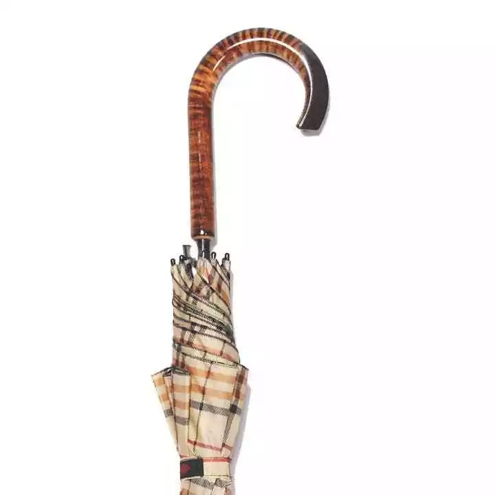 Tan Tartan Maple Crook Umbrella: The Tartans- Scorched European maple crook handle umbrella with Tan Tartan plaid nylon 27 inch canopy with 8 fiberglass ribs and fiberglass shaft; auto open; overall length 37.5 inches. Reserve: $80.0