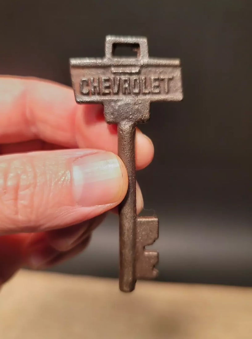 Iron Chevrolet Key: 3" long x 1 1/4" wide Nice iron Chevrolet key! Hard to tell its age. Heavy iron beautiful worn patina. Great aged patina throughout. Limited quantity available! Reserve: $10.00 Shipping: Domestic: Fla