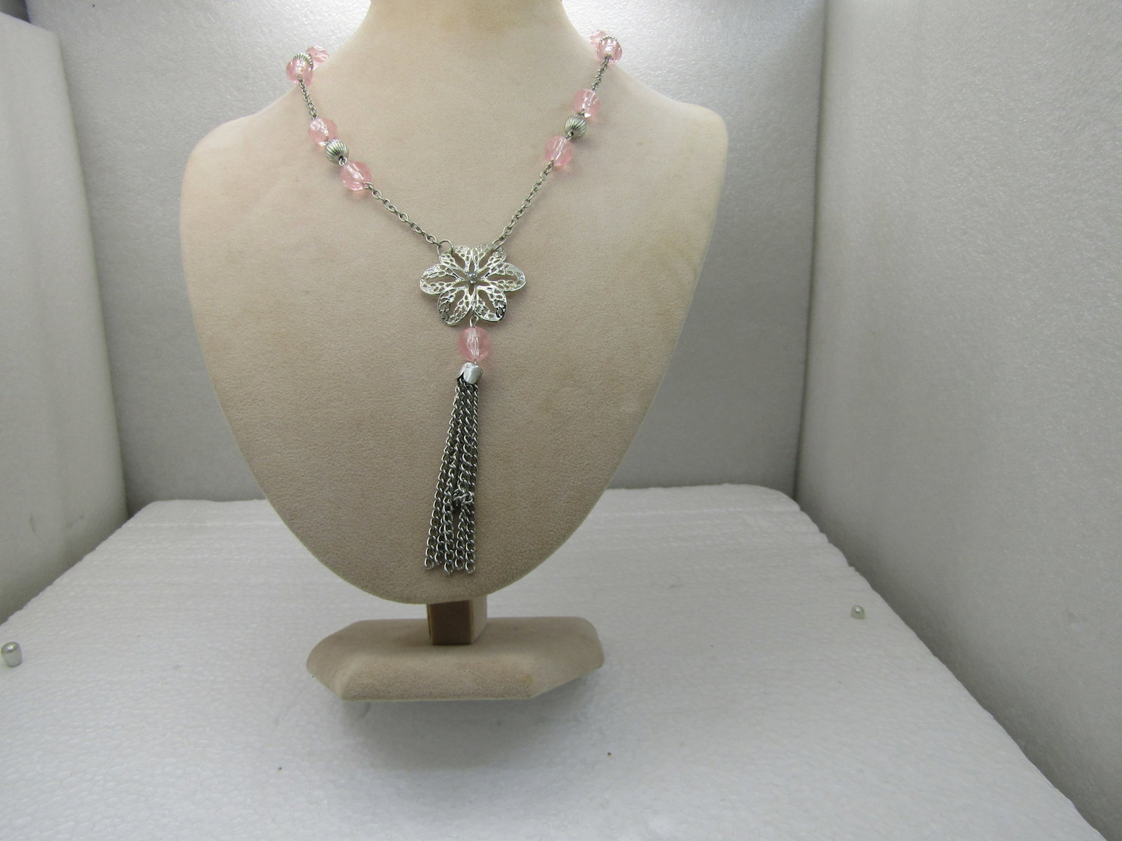 Vintage Floral Tassel Pink Faceted Beaded Necklace, 24", Silver Tone: Vintage Floral Tassel Pink Faceted Beaded Necklace, 24", Silver Tone with 4" floral filigree drop with tassel. 1980's-1990's. Not signed by maker. Very good condition, lucite beads and metal beads. Li
