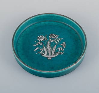 Wilhelm Kåge for Gustavsberg, Sweden, low Art Deco ceramic bowl with silver decoration: Wilhelm Kåge (1889-1960) for Gustavsberg, Sweden, low Art Deco ceramic bowl with silver decoration featuring a floral motif. From the "Argenta" series. Approximately 1940s. Excellent condition. D