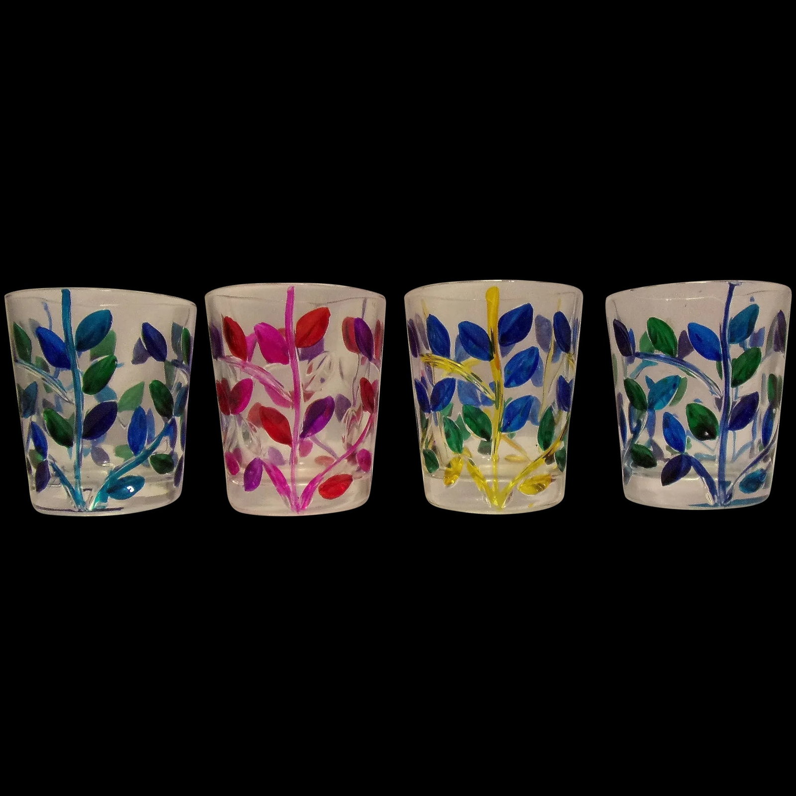 Vintage Intaglio Hand Painted Shot Glasses with Leaves: This set of 4 Vintage Intaglio Hand Painted Shot Glasses with Leaves are in excellent condition. NO chips, cracks, discoloration or loss of color. I suggest hand washing to avoid loss of color. Two of