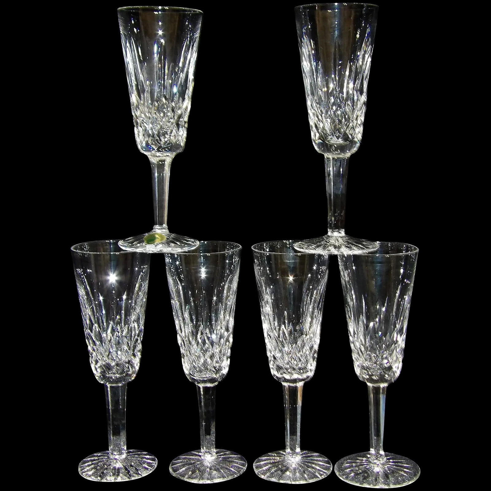 Vintage Waterford Lismore Tall Champagne Flutes: This set of 6 Waterford Lismore Tall Champagne Flute is in excellent condition. NO chips or flea bites and no discoloration. Of the 11 glasses I have only two had the original foil sticker from Irelan