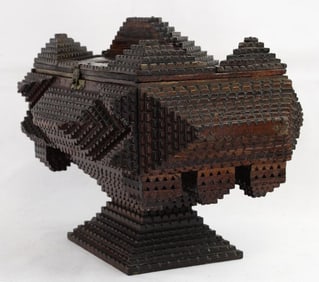 A nice Tramp art pedestal box in dark lacquer finish