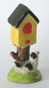 Antique bisque bird house figurine.