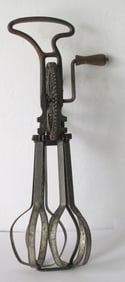 Antique tin & iron mechanical egg beater.