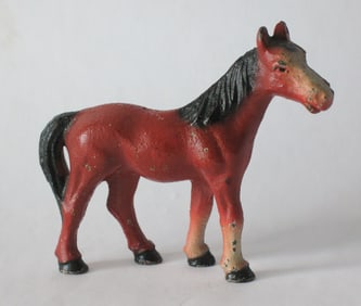 Vintage cast iron horse paper weight.
