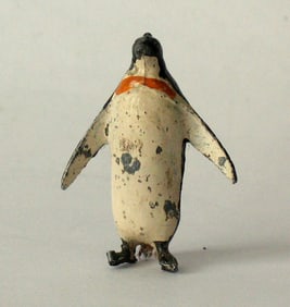 Antique miniature cast metal penguin paper weight.