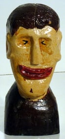 Folky  carved head and bust of a man