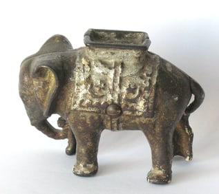 Antique cast iron elephant penny bank.