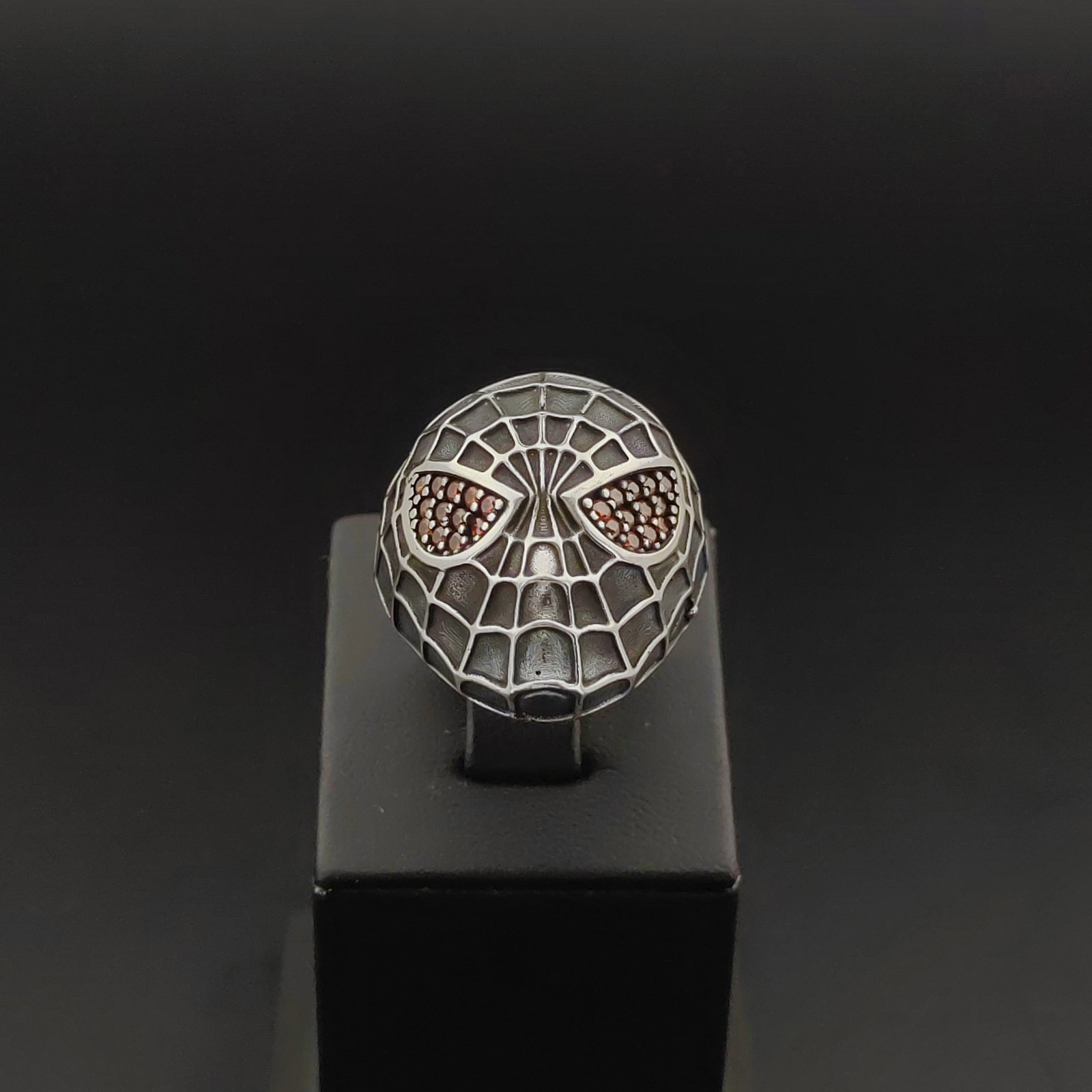 925 Sterling Silver Spiderman Ring Ornated with Red Zircons: Title:925 Sterling Silver Spiderman Ring Ornated with Red Zircons Description:925 Sterling Silver Spiderman Ring Ornated with Red Zircons -Total Weight:8.7g -Size:Adjustable With Gift Box Express Ship