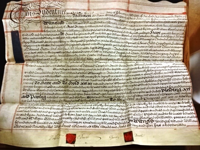 1752 Beautifully Penned London Deed Seals: DescriptionA beautifully penned English vellum indenture dated 1752 during the reign of George III conveying property in the parish of St. Giles Cripplegate, London, at Bridgewater Gardens between Wil