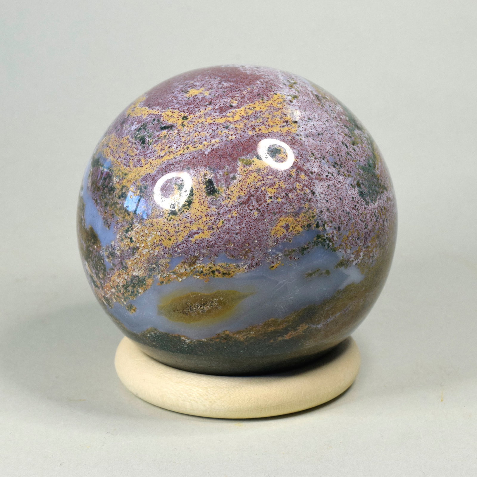 7.1 cm Polished Ocean Jasper sphere: Title: 7.1 cm Polished Ocean Jasper sphere Origin: Madagascar Size: 7.1 cm diameter Description: Species: Jasper (Ocean Jasper) Locality: Madagascar Diameter: 7.1 cm Weight: 0.47 kg Fine polished ocea