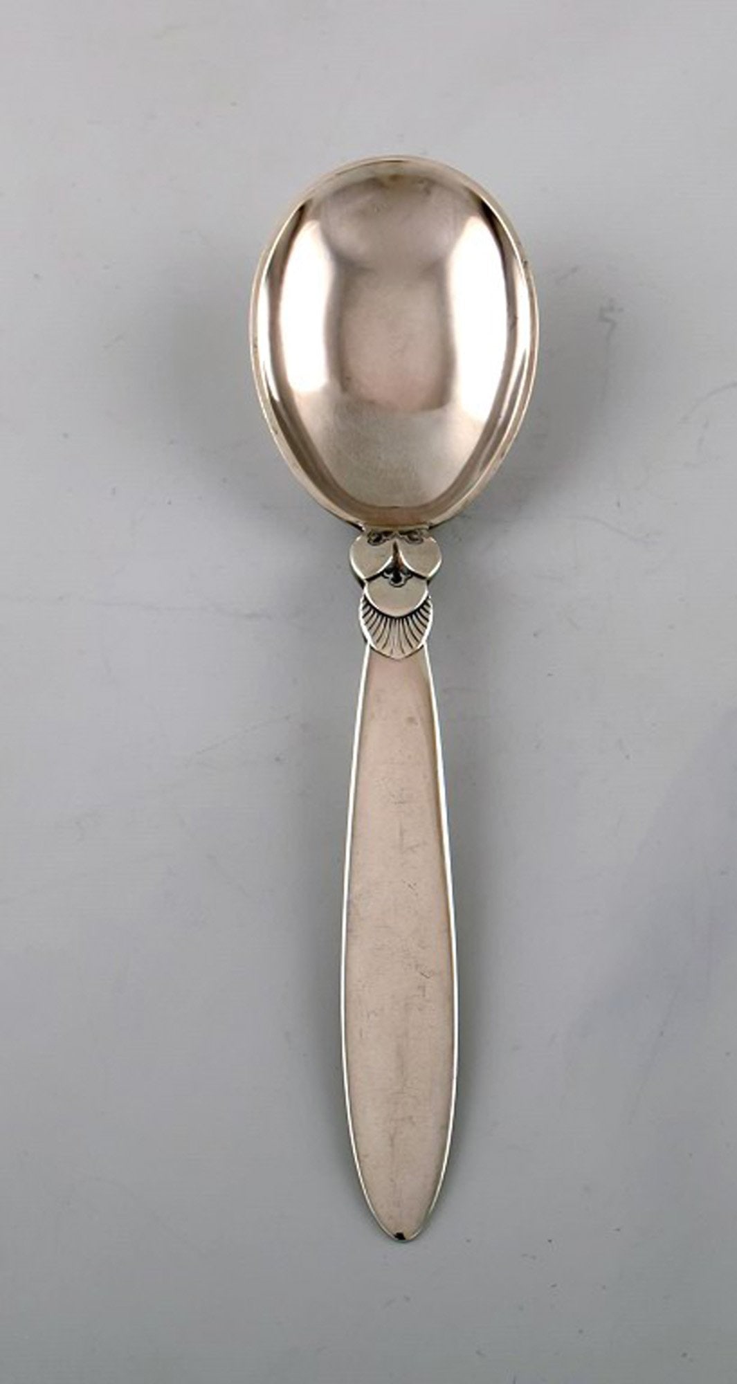 Early Georg Jensen "Cactus" serving spoon in sterling silver. Dated 1915-30.: Title:Early Georg Jensen "Cactus" serving spoon in sterling silver. Dated 1915-30. Description:Early Georg Jensen "Cactus" serving spoon in sterling silver. Dated 1915-30. Designer: Gundorph Albertus.