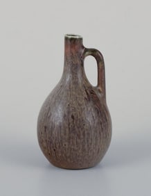 Carl Harry Stålhane for Rörstrand, miniature pitcher/vase in green-brown hues.