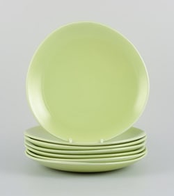 Stig Lindberg for Gustavsberg. Set of seven "Colorado" retro porcelain plates in apple green.