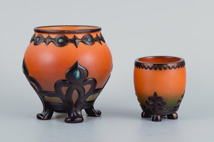 Ipsen's widow. Two small vases with glaze in orange-green shades.