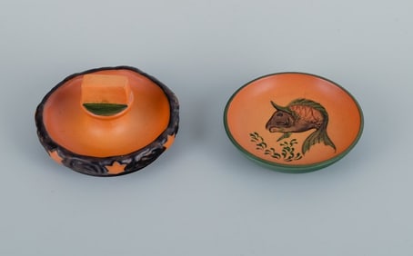Ipsen's, Denmark. Two small bowls with glaze in orange-green shades.