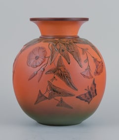 Ipsens, Denmark, vase with flowers and butterfly. Glaze in orange and green tones.