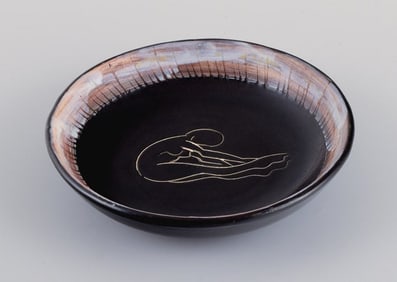 Valluris, France, unique ceramic bowl in black glaze with female motif.