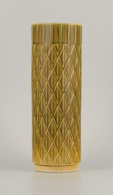 Gunnar Nylund for Rörstrand, "Eterna" cylindrical ceramic vase with green geometric pattern.