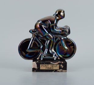 Rambervillers, French ceramic sculpture in the form of a cyclist with beautiful eosin glaze.